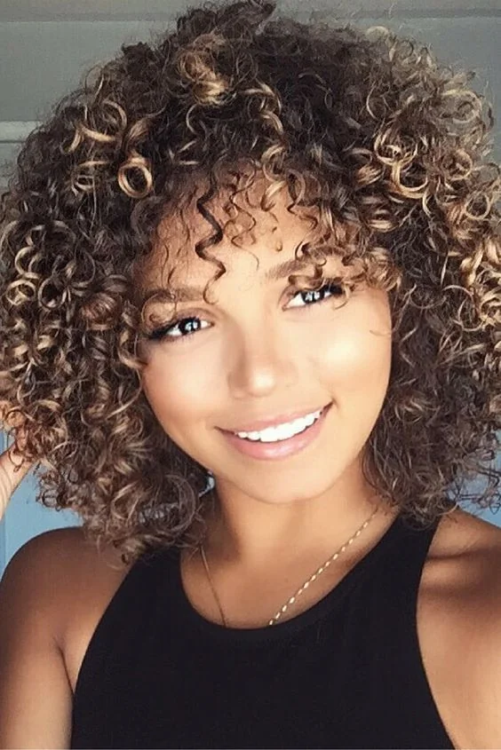 Woman with a bouncy wash-and-go style