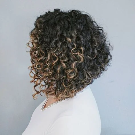 Stacked inverted curly bob from the back