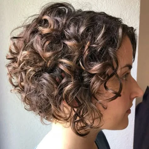 Tapered nape curly bob cut