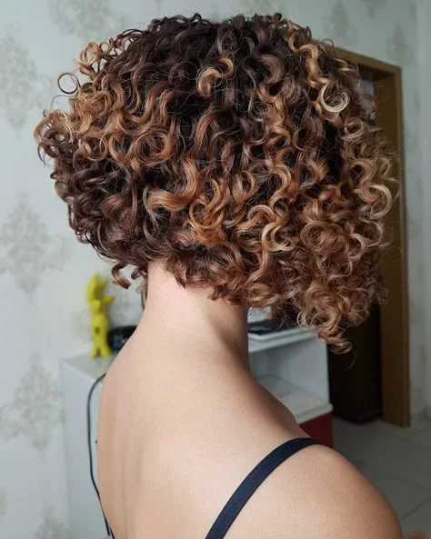Defined spiral curls in a bob cut
