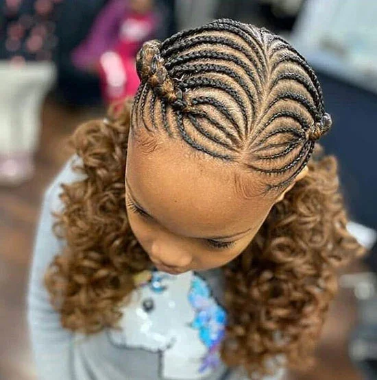 Kid with side lemonade braids