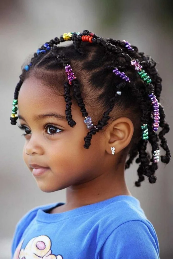 Toddler with beaded braid ends
