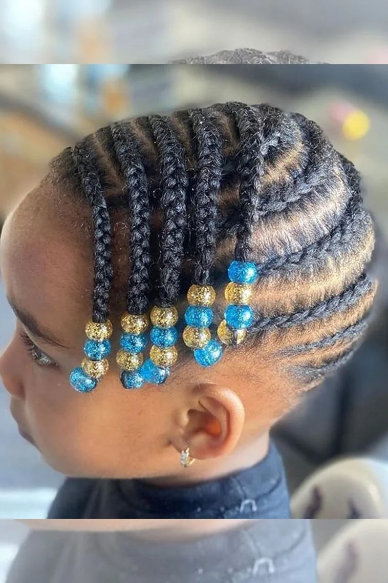 Kid with beaded fishtail braids
