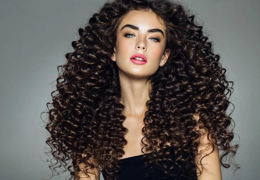 Woman with a spiral perm curly look