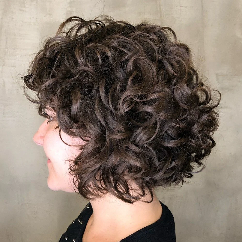 Woman with a voluminous curly bob