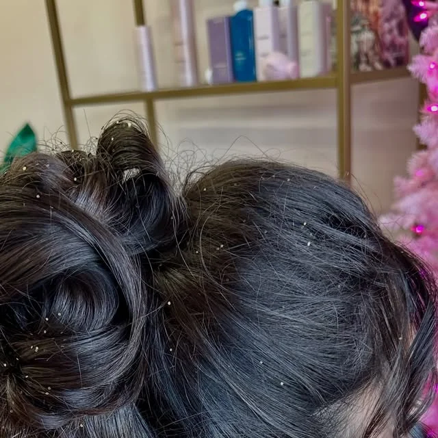 Rose shaped sculpted bun sprinkled with fine gold glitter.