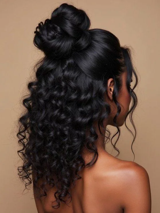 Woman with mini topknot and curly half down hair