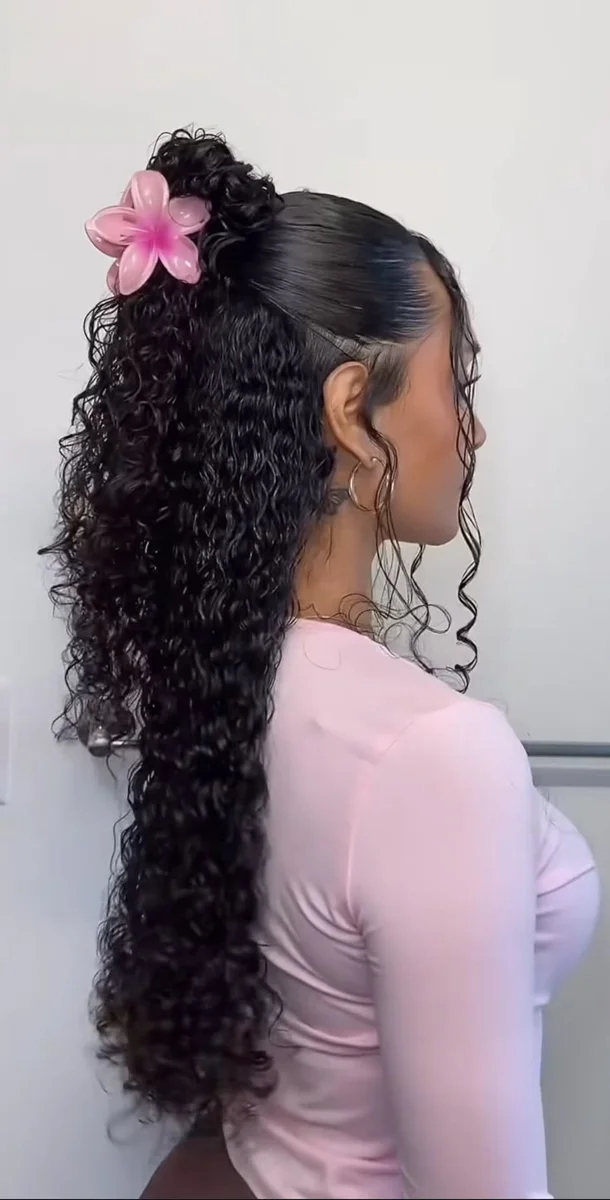 Woman with a romantic curly half updo