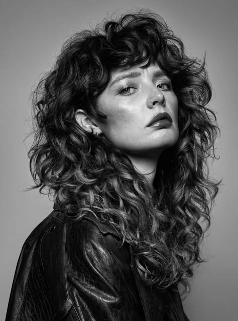 Woman with a textured curly shag haircut