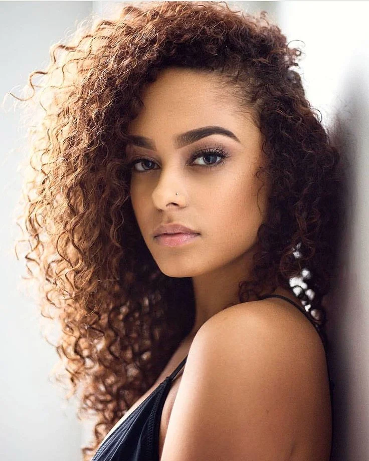 Woman with voluminous natural curly hair