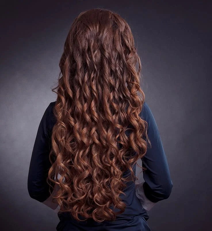 Woman with defined spiral ringlet curls