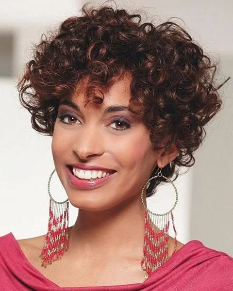 Woman with rounded curly shape pixie cut