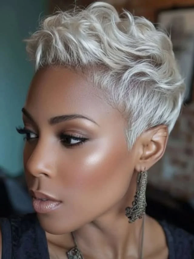 Woman with platinum curly crop pixie