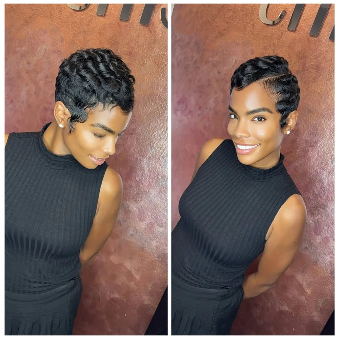 Woman with side swept ringlets curly pixie
