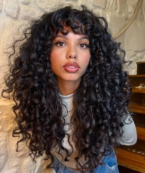 Curly curtain bangs with long hair