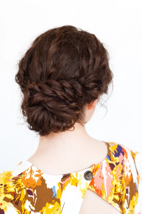 Woman with a rope twist curly updo